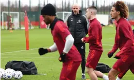  ?? Photograph: Darren Staples/AFP/Getty Images ?? The Manchester United manager, Erik ten Hag (centre), takes a training session before the Champions League match against Bayern Munich.