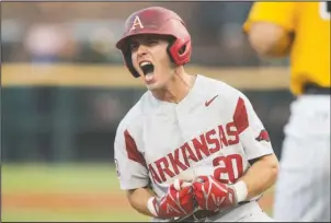  ?? NWA Democrat-Gazette/Ben Goff ?? SEVEN-RUN SECOND: Arkansas redshirt senior second baseman Carson Shaddy celebrates Saturday after reaching third base on a two-run triple in the second inning against Southern Miss at Baum Stadium in Fayettevil­le. The Razorbacks won, 10-2, to advance...