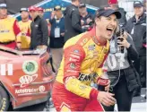  ?? MATT KELLEY/AP ?? Former NASCAR Cup Series champion Joey Logano celebrates after ending a 40-race winless drought with a victory Sunday at Darlington Raceway.