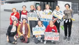  ?? PICTURE / LIAM PRINCE ?? Hannah Blumhardt and Holly Dove (bottom two on left) presented to the select committee last week with supporters wearing bottles and cans they’d found on beaches and streets around Wellington.