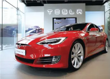  ??  ?? A Tesla Model S electric car is seen at its dealership in Seoul, South Korea.