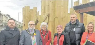  ??  ?? From left, Rhodri Allcock, Western Bay Youth Justice Building Skills Programme, Mayor Reg Jenkins, Mayoress Teresa Jenkins, Deborah Davies, chairman of governors, Tyrone Hughes and acting head teacher Jo Blackman-Hunt at Tynyrheol Primary School,...