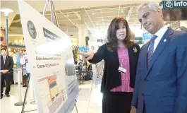  ?? | SUN- TIMES FILE PHOTO ?? Mayor Rahm Emanuel looks over the proposed layout of new concession­s at Midway Airport in August 2015, with Midway manager Erin O’Donnell.