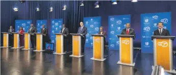  ?? TYLER PASCIAK LARIVIERE/SUN-TIMES ?? Mayoral candidates at a debate Jan. 19 at ABC7 Chicago’s studio. From left are Ja’Mal Green, Ald. Sophia King, Rep. Kam Buckner, Willie Wilson, Commission­er Brandon Johnson, Paul Vallas, Mayor Lori Lightfoot, Ald. Roderick Sawyer and Rep. Jesus “Chuy” Garcia.