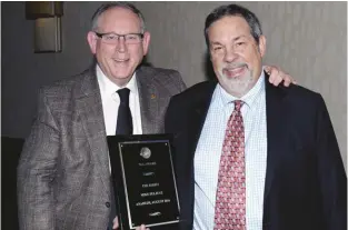  ??  ?? Donn Pearlman with Mike Fuljenz, 2016 recipient of The Ribbit award from the NLG.