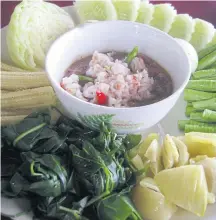  ??  ?? SOME LIKE IT HOT: Right, spicy shrimp paste relish (‘nam prik kapi’) with fried mackerel (‘pla thu thod’). Above and below right, other chilli pastes which can be served with steamed or fresh vegetables.
