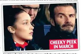  ??  ?? Looking: Beckham steals glance at Bella at a football match CHEEKY PEEK IN MARCH