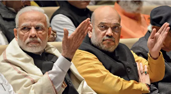  ?? PANKAJ NANGIA/MAIL TODAY ?? OUR WAY OR THE... PM Modi and Shah in Parliament after the opening of the winter session on Dec. 13