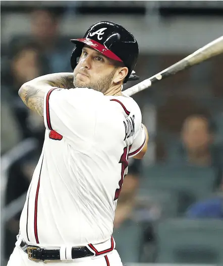  ?? — GETTY IMAGES ?? While a veteran such as first baseman Matt Adams might fetch plenty of future help for the Atlanta Braves, he’s also helping the team stay on the edge of playoff contention this season.