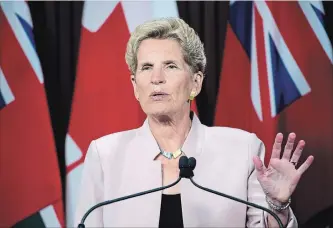  ?? NATHAN DENETTE
THE CANADIAN PRESS ?? Liberal leader Kathleen Wynne speaks to the media at Queen’s Park on Monday.