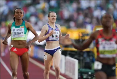  ?? ?? A suffering Laura Muir crosses the line in third, but the bronze medal was worth the agony