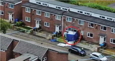  ?? ?? Scene: A police forensics tent is set up yesterday outside the home where teenager was killed