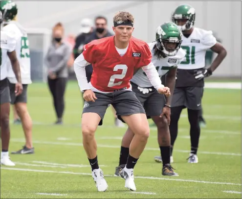  ?? Bill Kostroun / Associated Press ?? New York Jets first-round draft pick Zach Wilson works out during NFL rookie camp on Friday.