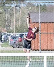  ?? Photo by Becky Polaski ?? Bradyn Pistner is shown serving during the second singles match against DuBois Area on Monday.