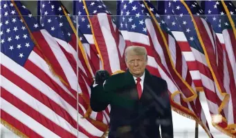  ?? AP ?? STIRRING UP TROUBLE: President Trump arrives to speak at a Wednesday rally in Washington, D.C., after which his supporters overran the Capitol building.