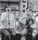  ??  ?? Teresa Horgan and Matt Griffin perform at O’Sullivan’s Courthouse Pub in Dingle. The town, on Ireland’s southwest coast, has a lively pub scene.