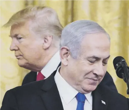  ?? PICTURE: AFP/GETTY ?? 0 Donald Trump and Benjamin Netanyahu announce the US Middle East peace plan in the White House