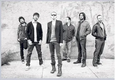  ??  ?? hahn (fourth from left), who studied visual arts in college, is responsibl­e for the artworks on some of Linkin Park’s albums. — Filepic