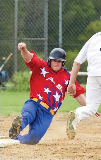  ?? Photo: Nev Madsen ?? STATE DUTIES: Lewis Codd (left) slides safely into first base. Codd has been named in the Queensland Patriots team competing at the Australian championsh­ips.