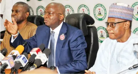  ?? Photo: NAN ?? From left: Permanent Secretary, Ministry of Power, Mr Louis Edozien; Minister of Power, Works and Housing, Mr Babatunde Fashola and the Permanent Secretary, Ministry of Works and Housing, Alhaji Mohammed Bukar, during a news conference on the ‘Third Year Progress Report’ of the ministry in Abuja yesterday.