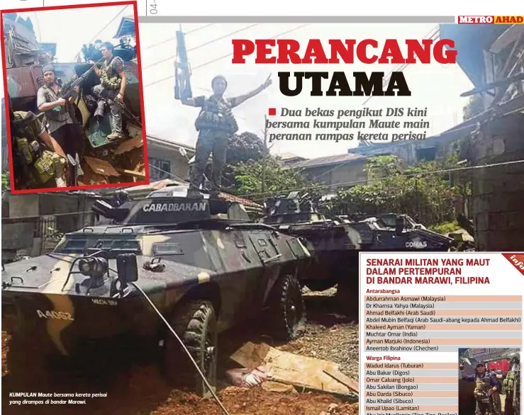  ??  ?? KUMPULAN Maute bersama kereta perisai yang dirampas di bandar Marawi.