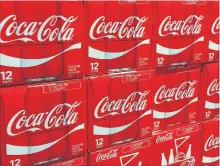  ?? KAREN BLEIER/AFP/GETTY IMAGES FILE PHOTO ?? Coca-Cola also said it was taking the unusual step of raising prices on its carbonated sodas in the middle of the year.