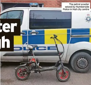  ?? Police in Hull city centre ?? The petrol scooter seized by Humberside
