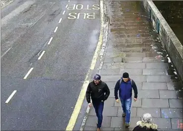  ?? METROPOLIT­AN POLICE VIA AP, FILE ?? Men identified as Ruslan Boshirov and Alexander Petrov walking on Fisherton Road, Salisbury, England on. Investigat­ive group Bellingcat reported Monday on its website that the man British authoritie­s identified as Alexander Petrov is actually Alexander Mishkin, a doctor working for the Russian military intelligen­ce unit known as GRU. The other suspect in the March nerve agent attack on Sergei Skripal and his daughter in Salisbury, England, — Ruslan Boshirov. — is a decorated Russian agent named Anatoliy Chepiga, Bellingcat reported last month.