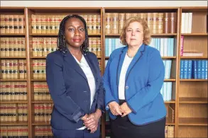 ?? Cloe Poisson / CHIT ?? Christine Rapillo, right, chief public defender for the state Division of Public Defender Services, and Jassette Henry, a senior assistant public defender in New Britain and a tri-chair of the Racial Justice and Cultural Competency Committee, say they see higher rates of domestic violence arrests in communitie­s of color.