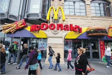  ?? ERIC RISBERG/THE ASSOCIATED PRESS ?? McDonald’s Corp. is aiming to boost its long-term systemwide sales growth and operating margins by focusing more on the US$100-billion restaurant delivery market. It is also banking on digital technology, such as mobile ordering and payments, for growth.