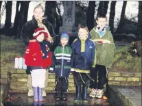  ?? ?? Locals Suzanne O’Donoghue, Katie Fogarty, Daniel O’Callaghan, Niall Fogarty and Christophe­r O’Donoghue, at the St Fanahan’s Day ceremonies at the Holy Well in Mitchelsto­wn back in 2000.