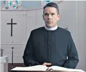  ??  ?? Desperate times: Ethan Hawke as a priest traumatise­d by his past