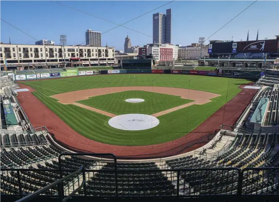  ?? AP FIle ?? WAITING GAME: An empty Parkview Field minor league baseball stadium is viewed in downtown Fort Wayne, Indiana. Minor league umpires are out of jobs so far and maybe all year with no minor league seasons due to the coronaviru­s pandemic.