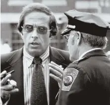  ?? HERALD FILE PHOTO ?? ‘STRONG PERSONALIT­Y’: Former Boston police Commission­er Robert di Grazia, seen at left above in 1975, has died.