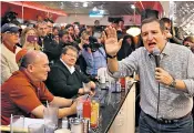  ??  ?? Ted Cruz meets voters at a diner in Iowa. He hopes that evangelica­l Christians will help him to victory