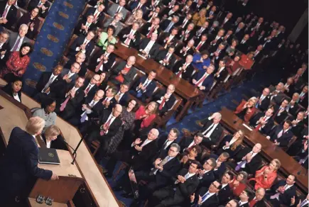  ?? BRENDAN SMIALOWSKI/AFP VIA GETTY IMAGES ?? President Donald Trump delivers the State of the Union address in the House of Representa­tives on Tuesday night.