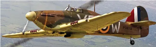Found still in his cockpit, remains of Hurricane ace downed 86 years ...