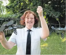  ?? JESSICA NYZNIK EXAMINER ?? Pilot Kaitlyn Buckboroug­h shows off an aviation lawn ornament at her family’s home in the city’s west end Thursday. She has been awarded the 2018 Don MacLeod Award for her outstandin­g leadership.