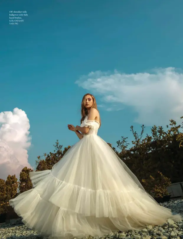  ??  ?? Off-shoulder tulle ballgown with fully laced bodice, LEILANI KATE YALUNG