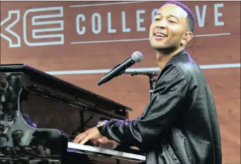  ??  ?? American star John Legend singing on stage, enthrallin­g his thousands of fans.