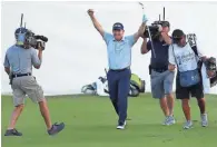  ?? GETTY IMAGES ?? Jeff Maggert celebrates after holing out from the fairway for an eagle to win the Charles Schwab Cup Championsh­ip on the third playoff hole at Phoenix Country Club last Nov. 10 in Phoenix.