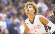  ?? Tony Overman / The Olympian ?? Wilson’s Emmitt Matthews Jr. during a boys basketball game at Wilson High School in Tacoma, Wash., on Jan. 24.