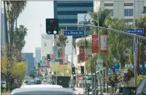  ?? MONICA ALMEIDA / THE NEW YORK TIMES ?? Traffic fills a street in Los Angeles in this March 25, 2013, photo. Artificial intelligen­ce and other advances in traffic systems hold promise to ease commuters’ headaches — but that promise comes with a hefty bill.