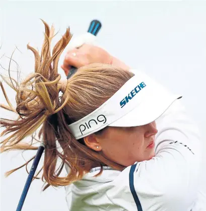  ?? CHLOE KNOTT/R&A GETTY IMAGES ?? Brooke Henderson had four birdies in six holes on Carnoustie’s front nine Friday, taking advantage of calm morning conditions.