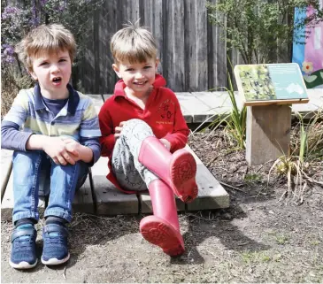  ??  ?? Cousins Jack Wilson and George Wilson spend time in the Poowoing Pre-School’s bush tucker garden.