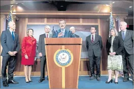  ?? ANDREW HARNIK — THE ASSOCIATED PRESS ?? Sen. Ted Cruz, R-Texas, accompanie­d by from left, Sen. Rick Scott, R-Fla., Sen. Shelley Moore Capito, R-W.Va., and Sen. John Hoeven, R-N.D., Sen. Chuck Grassley, R-Iowa, Sen. Todd Young, R-Ind., Sen. Joni Ernst, R-Iowa, and Sen. John Cornyn, R-Texas, speaks at a news conference on Capitol Hill in Washington to speak about immigratio­n at the U.S.Mexico boarder.