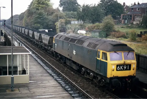  ??  ?? ABOVE: Class
47/3 47374 passes through the diminutive and shabby Knottingle­y station in October 1975, heading for either Eggborough or Drax power stations. (Colour Rail/G Parry Collection)