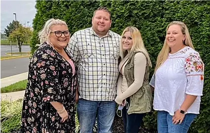  ?? Sharon Whitman via AP ?? In this photo taken in October 2020, Jennifer Lannon (second from right) poses for a photo with her brother Chris Whitman, second from left, and sisters, Sarah Whitman (far left) and Kim Bermudez in Blackwood, N.J.