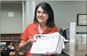  ?? SCOTT BAUER/AP ?? U.S. Senate candidate Leah Vukmir submits nomination papers with election officials last week in Madison, Wis.