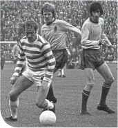  ??  ?? Thistle skipper Alex Rae keeps an eye on Celtic’s Harry Hood in the 1971 League Cup Final as Denis Mcquade looks on